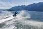 An adventurous individual enjoying a jet ski ride on the water during Vancouver Water Adventures Bowen Island Dinner Tour